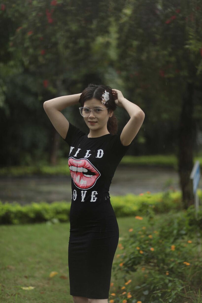Photo 2 — Cute girl gets naked in the garden