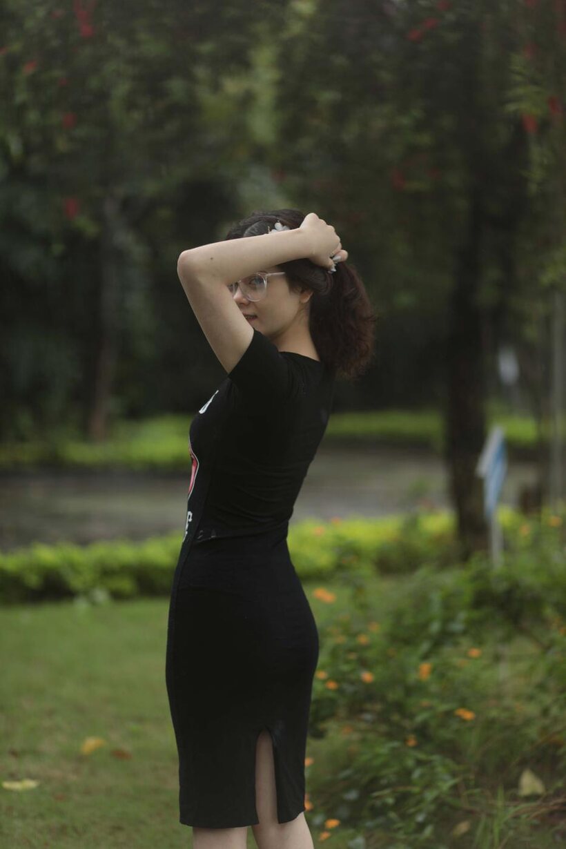 Photo 3 — Cute girl gets naked in the garden