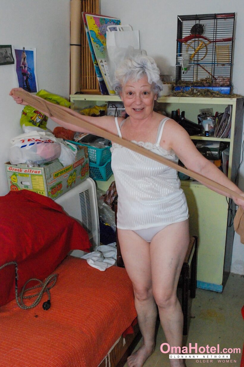Image 6/20: Agnes works a dildo into her hairy pussy, craving cock