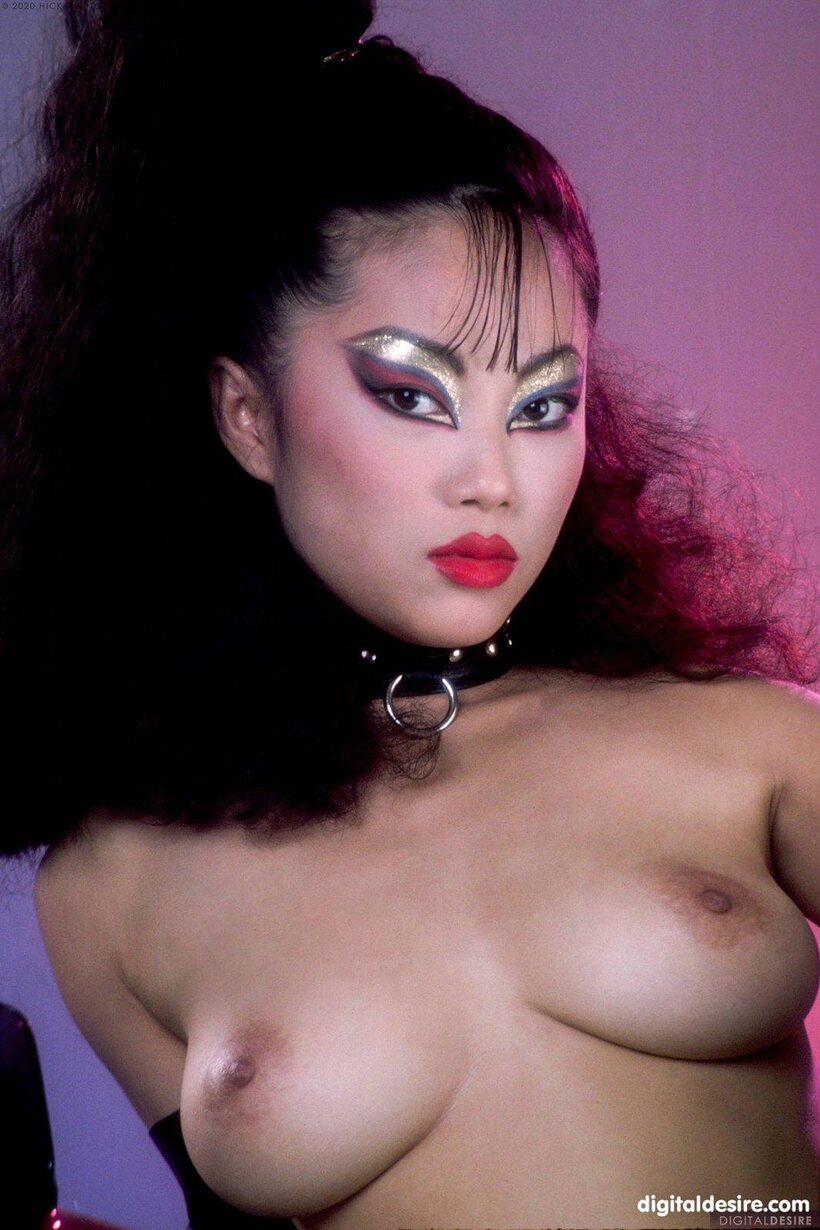 Asian pic 1 from the set «MILF poses with her trimmed pussy on display in gloves»