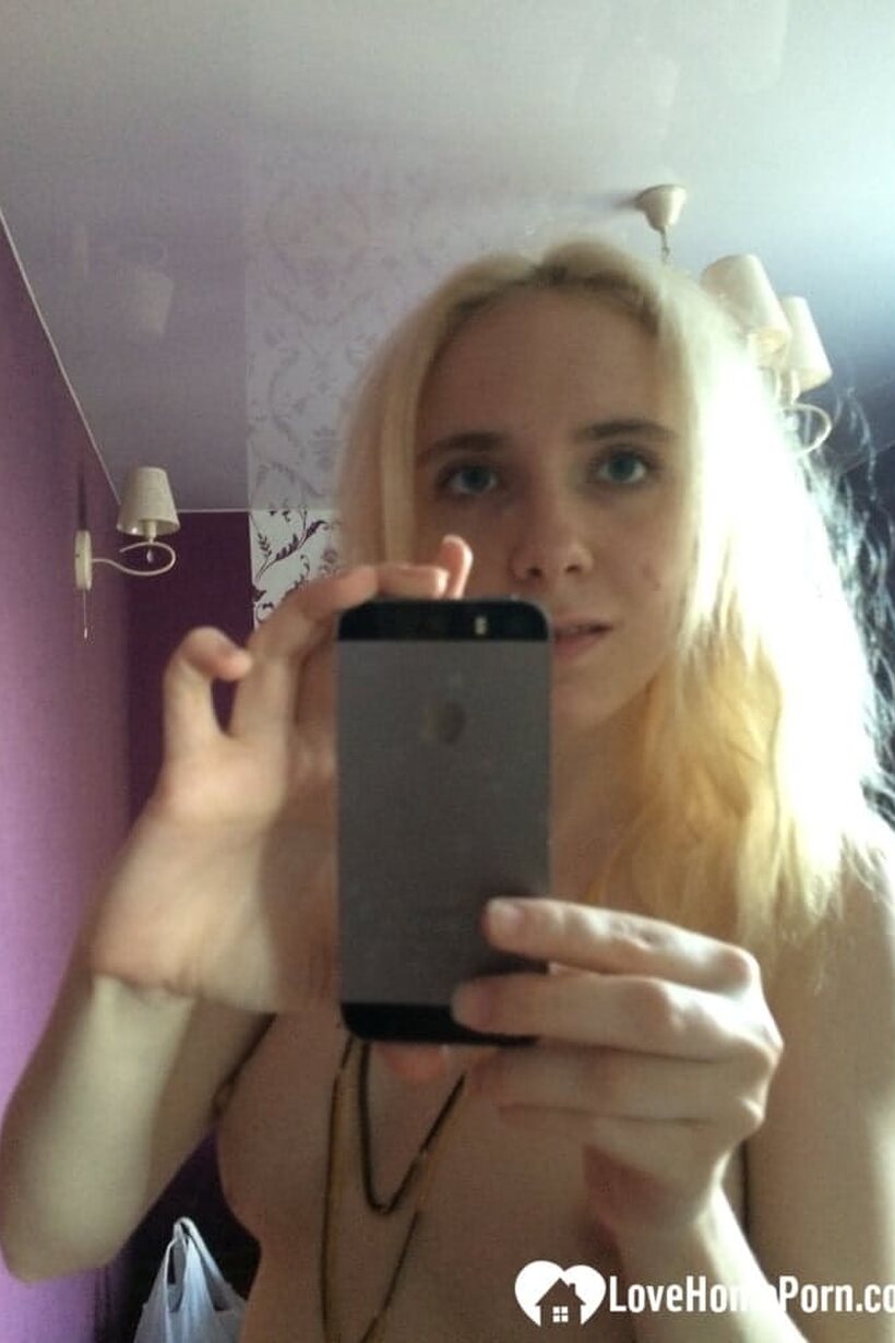 Photo 11 — Mirror pose shows Isabel Stern naked in her bedroom, flaunting ass and pussy