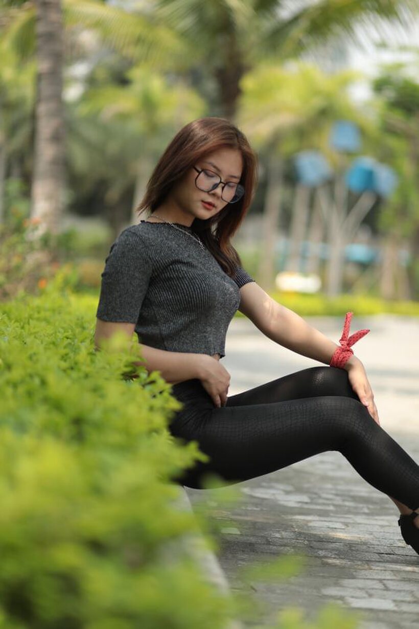 Photo 16 — Natalia strikes a sexy public pose in her glasses and outfit