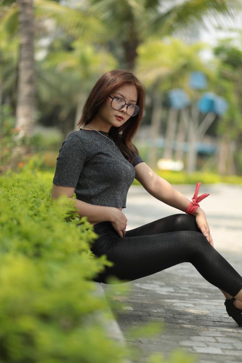 Natalia strikes a sexy public pose in her glasses and outfit (shot 17)
