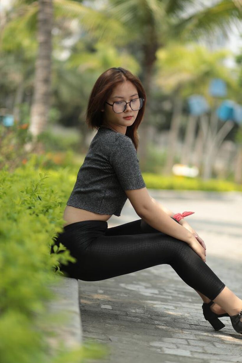 Natalia strikes a sexy public pose in her glasses and outfit, photo 19 of 21