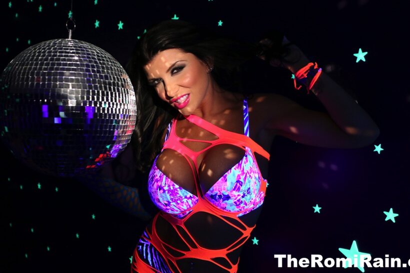 Image 5/16: Pornstar Romi Rain shows off her big tits and pussy in high heels