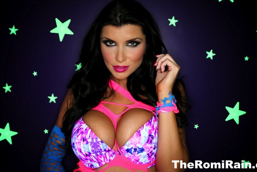 Pornstar Romi Rain shows off her big tits and pussy in high heels, photo 12 of 16