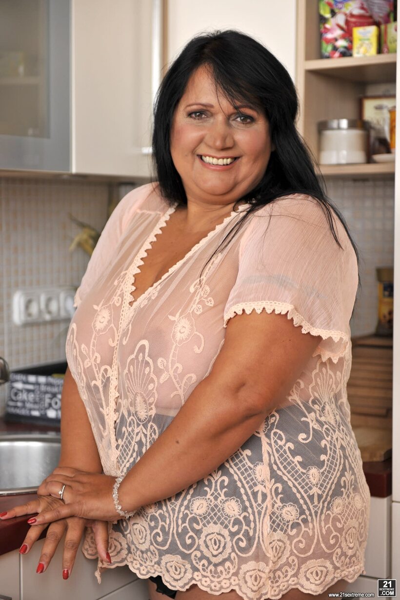 BBW nude photo 5 — Bubi poses in the kitchen while showing off her big natural tits
