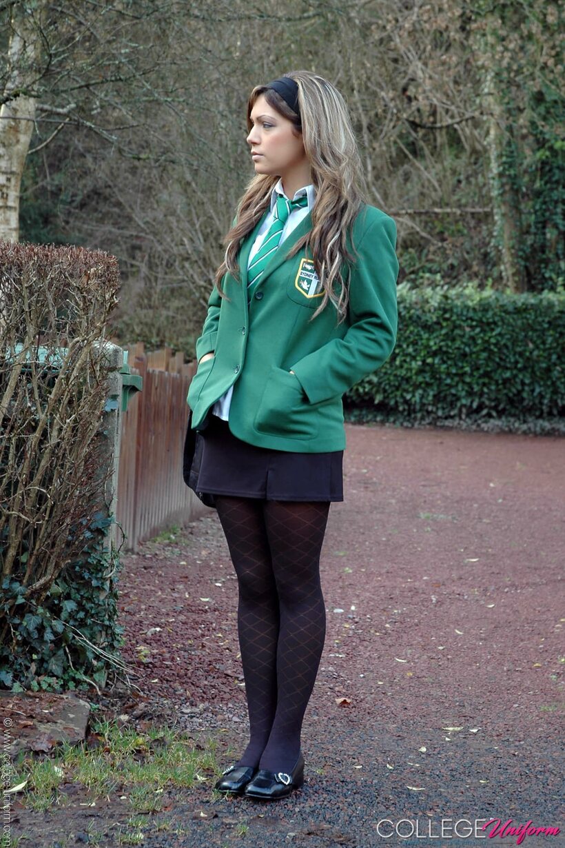 Photo 4 — Samantha Buxton strips out of her uniform and plays with her tits