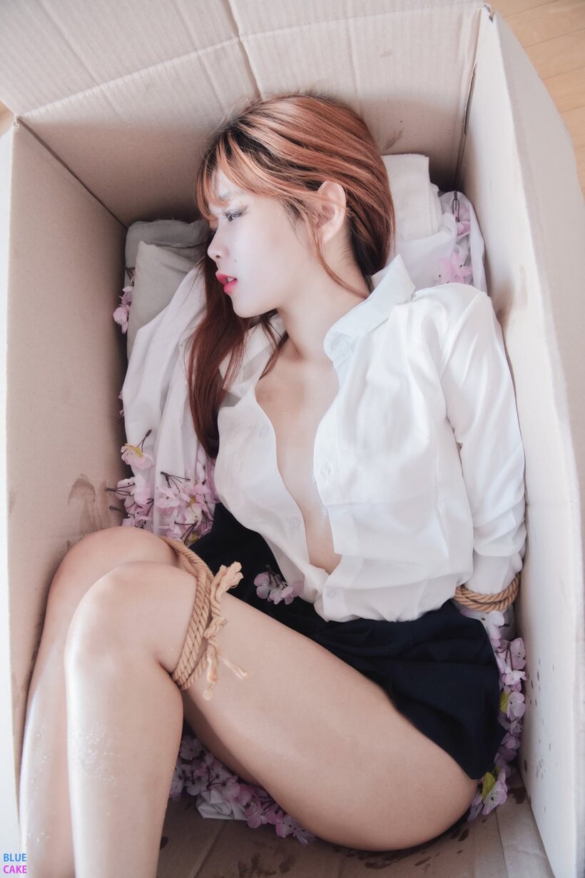 Photo 2 — Asian girl up close: big tits and feet in lingerie