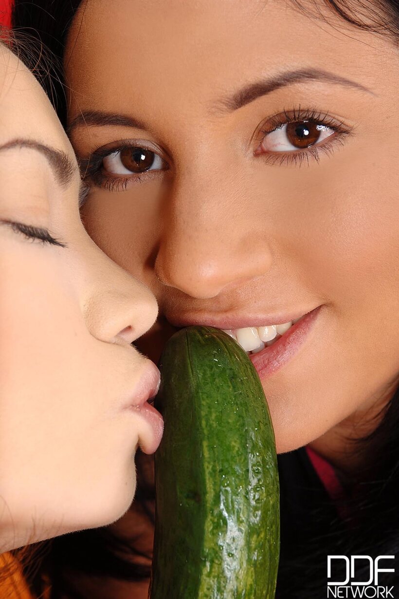 Krisztina Banx and Lola trade dildo and fruit fucking in teen lesbian action (shot 3)