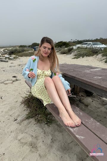 Riley Rose bares her pussy on the boardwalk, then strips down