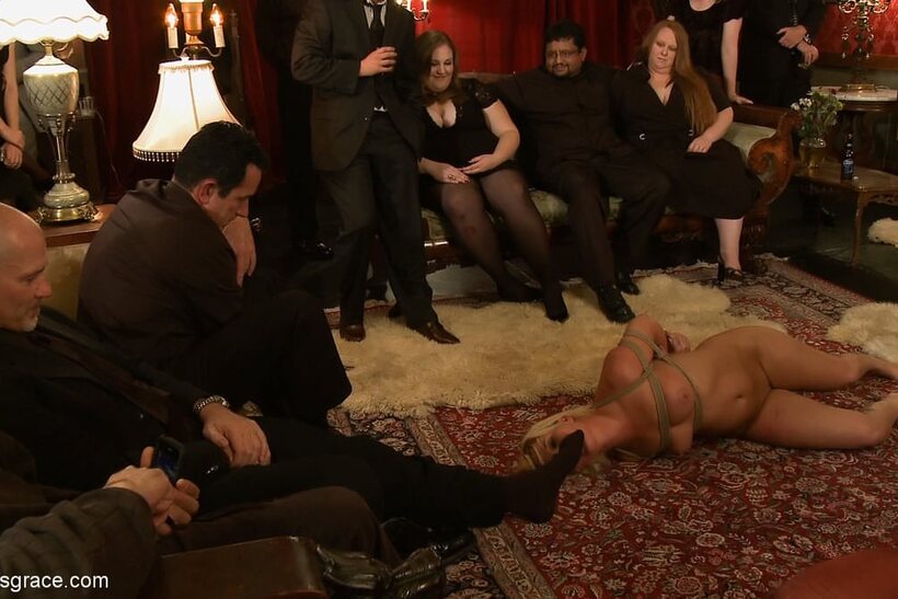 Photo 2 — Sasha Knox joins bondage fun at an adult party