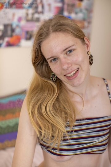 Clara M strips slowly, showing off her hairy pussy and ass