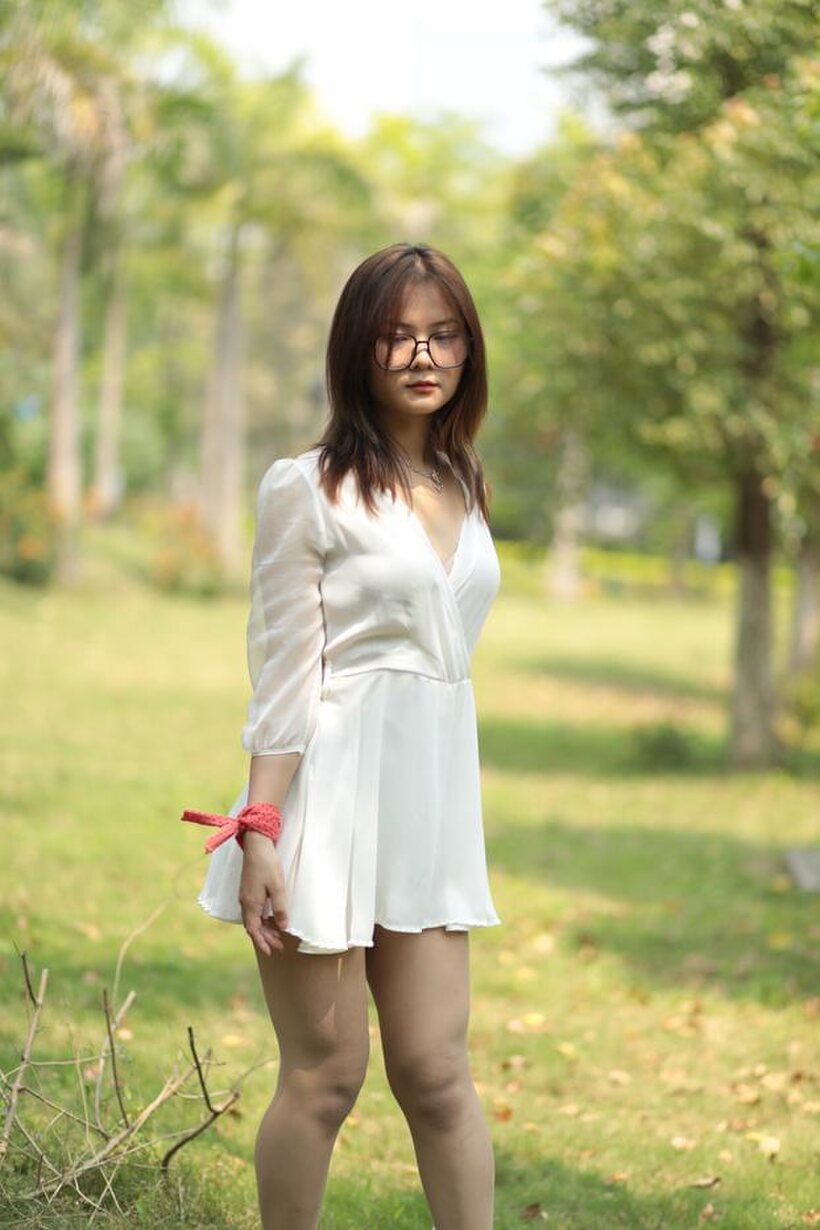 Asian pic 3 from the set «Glasses on, Asian babe Natalia shows off her outfit outdoors»