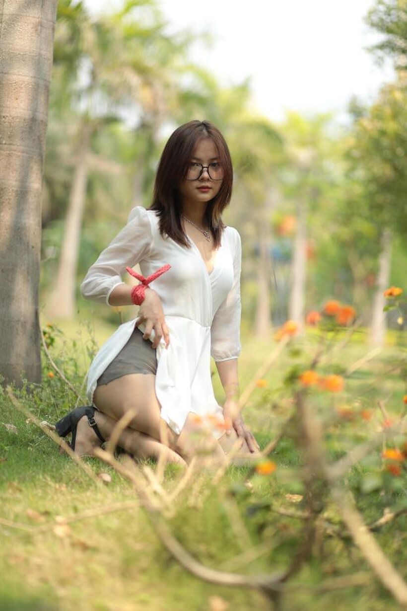 Asian nude photo 19 — Glasses on, Asian babe Natalia shows off her outfit outdoors