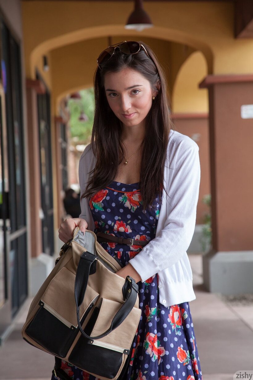 Photo 1 — Clothed Olive Southard spreads her ass while flashing