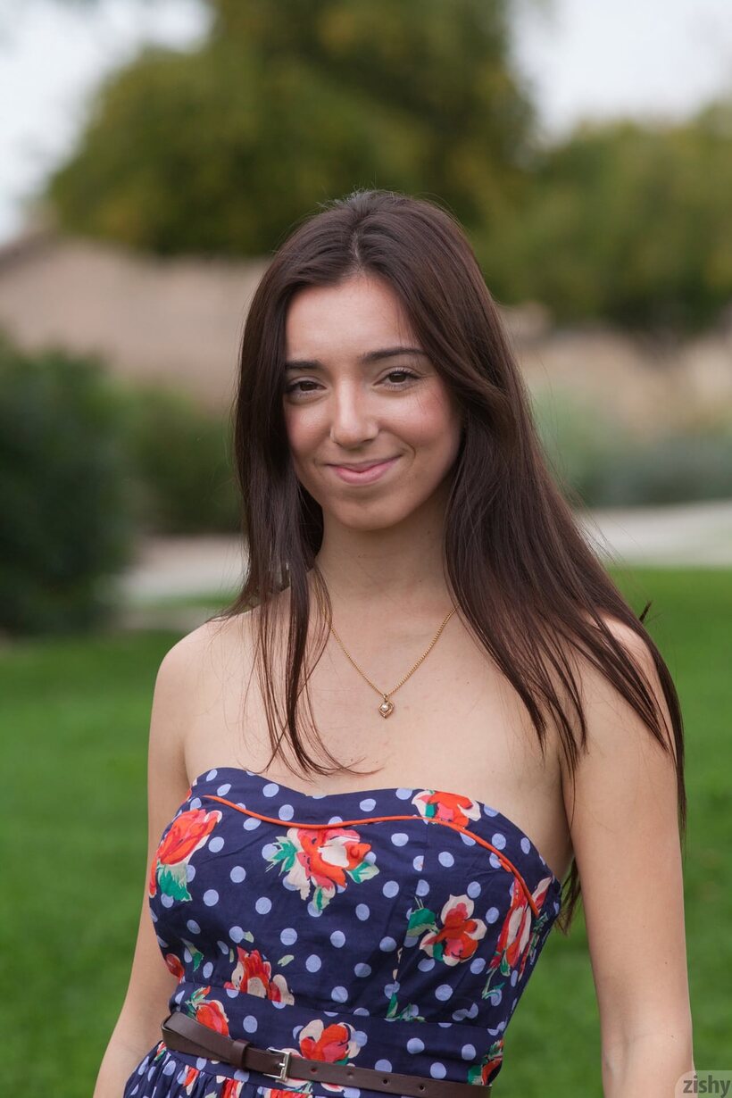 Image 6/11: Clothed Olive Southard spreads her ass while flashing