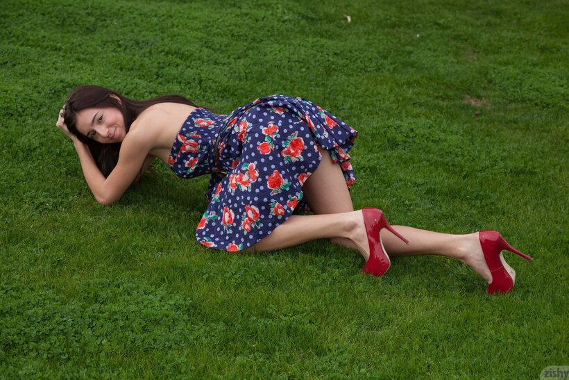Photo 9 — Clothed Olive Southard spreads her ass while flashing