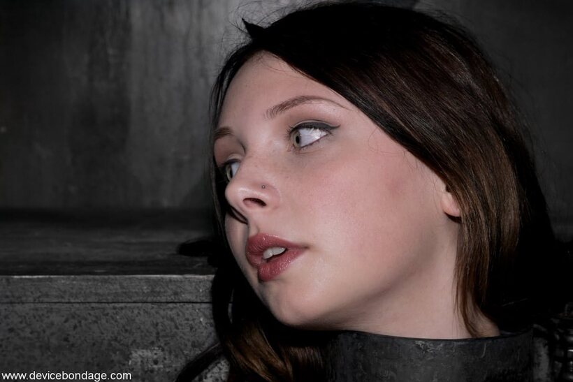 Clothed Sara Scott tied up in bdsm lingerie (shot 5)