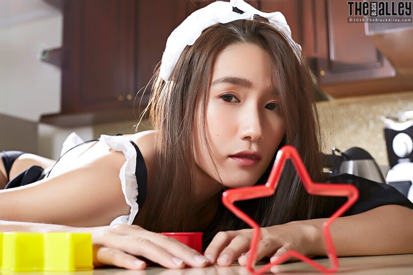 Photo 8 — Cute Asian maid Chialing shows off her tits and pussy in the kitchen