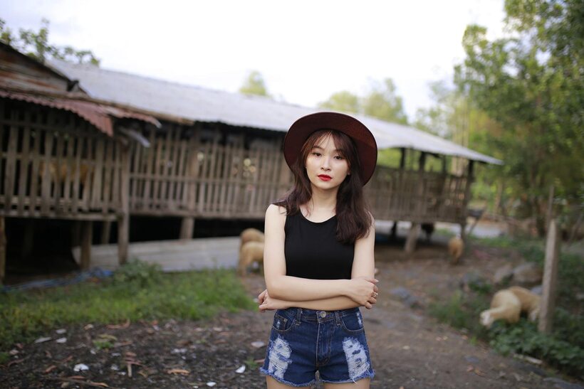 Image 2/21: Clothed girl spreads her ass in shorts