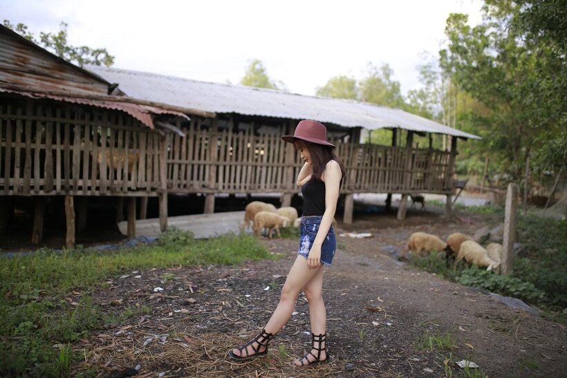 Image 3/21: Clothed girl spreads her ass in shorts