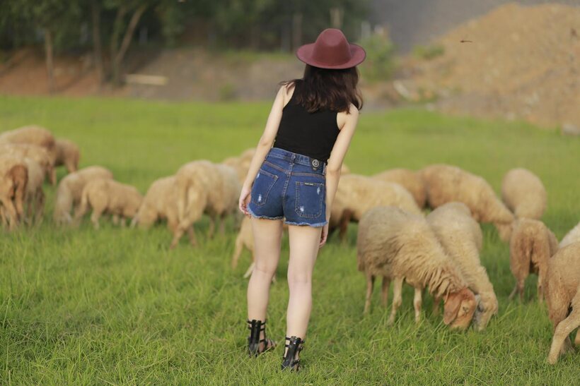 Photo 6 — Clothed girl spreads her ass in shorts