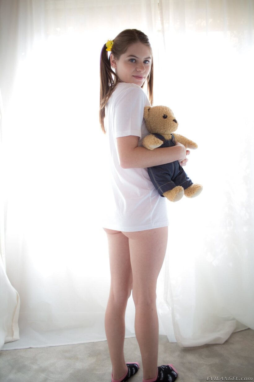 Photo 6 — Pornstar Alice March flaunts her natural tits and nipples while spreading
