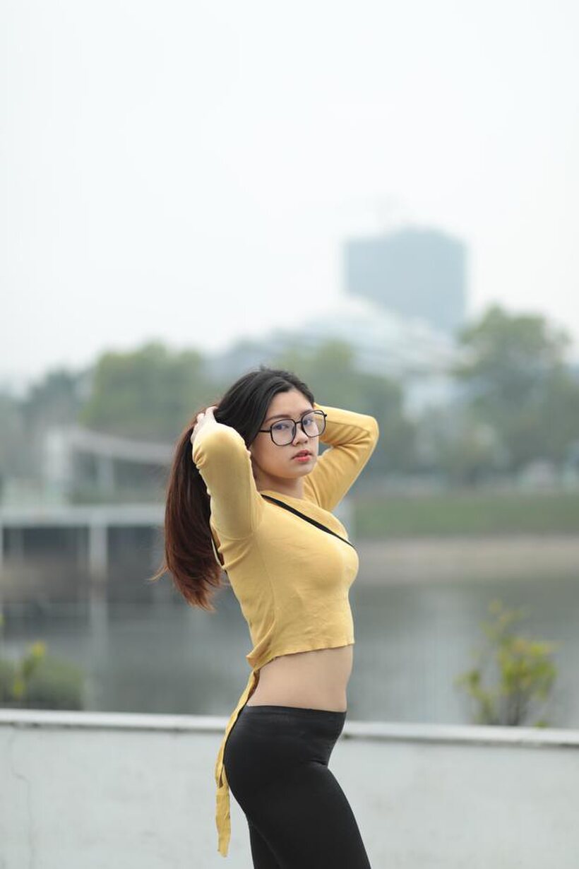 Photo 7 — Clothed girl gets naked outdoors