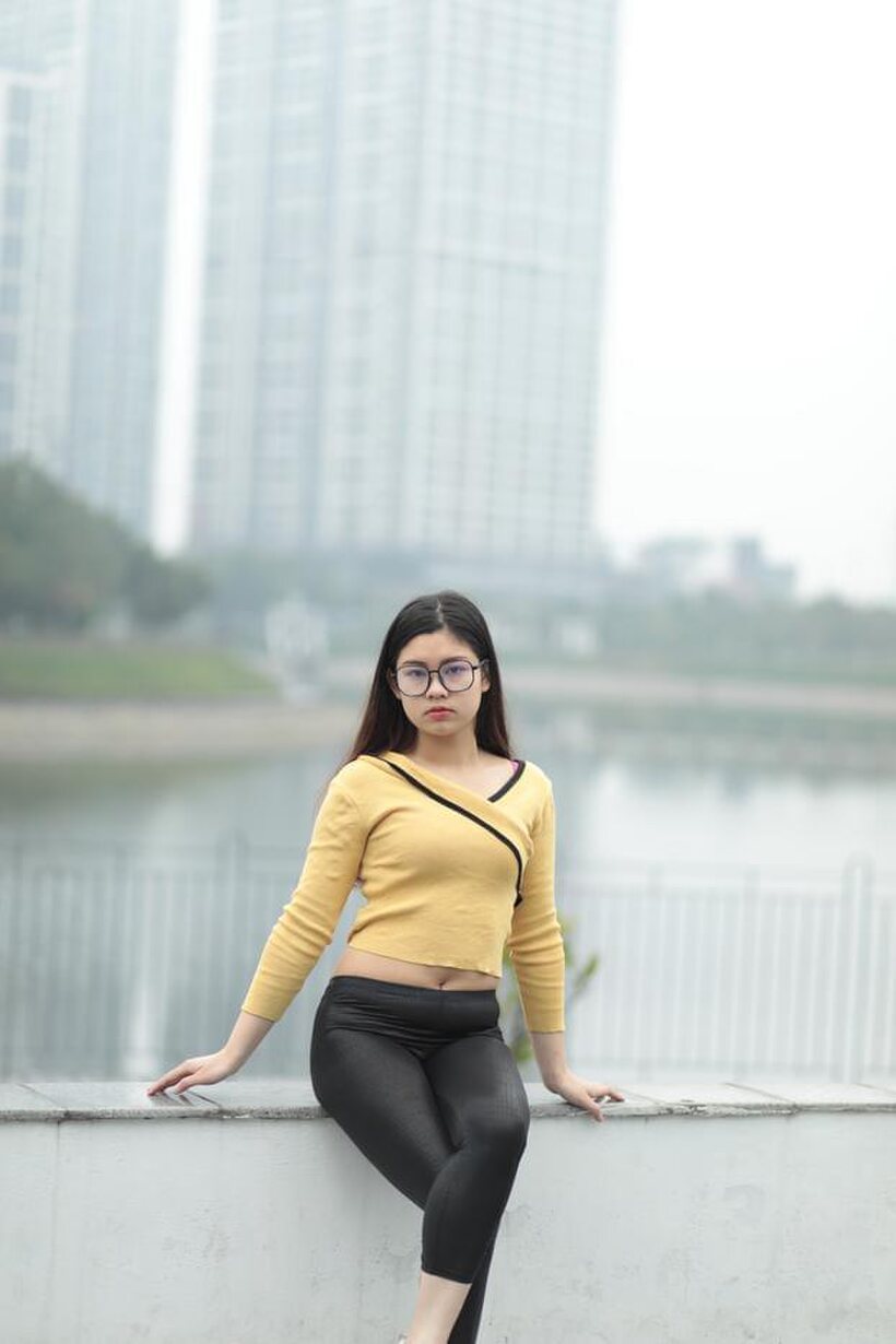 Image 18/21: Clothed girl gets naked outdoors