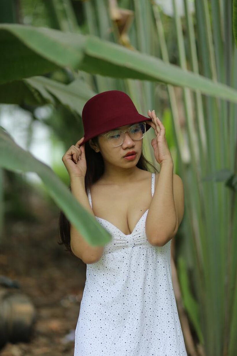 Photo 2 — Petite girl gets naked outdoors