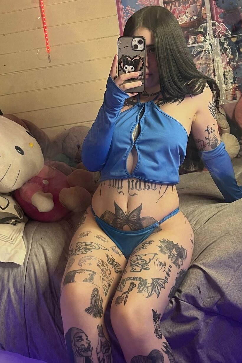 Selfie shots from a dark-haired amateur in a sheer top and thong (shot 9)