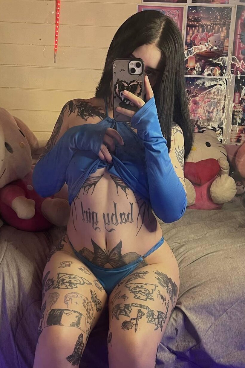 Image 10/20: Selfie shots from a dark-haired amateur in a sheer top and thong
