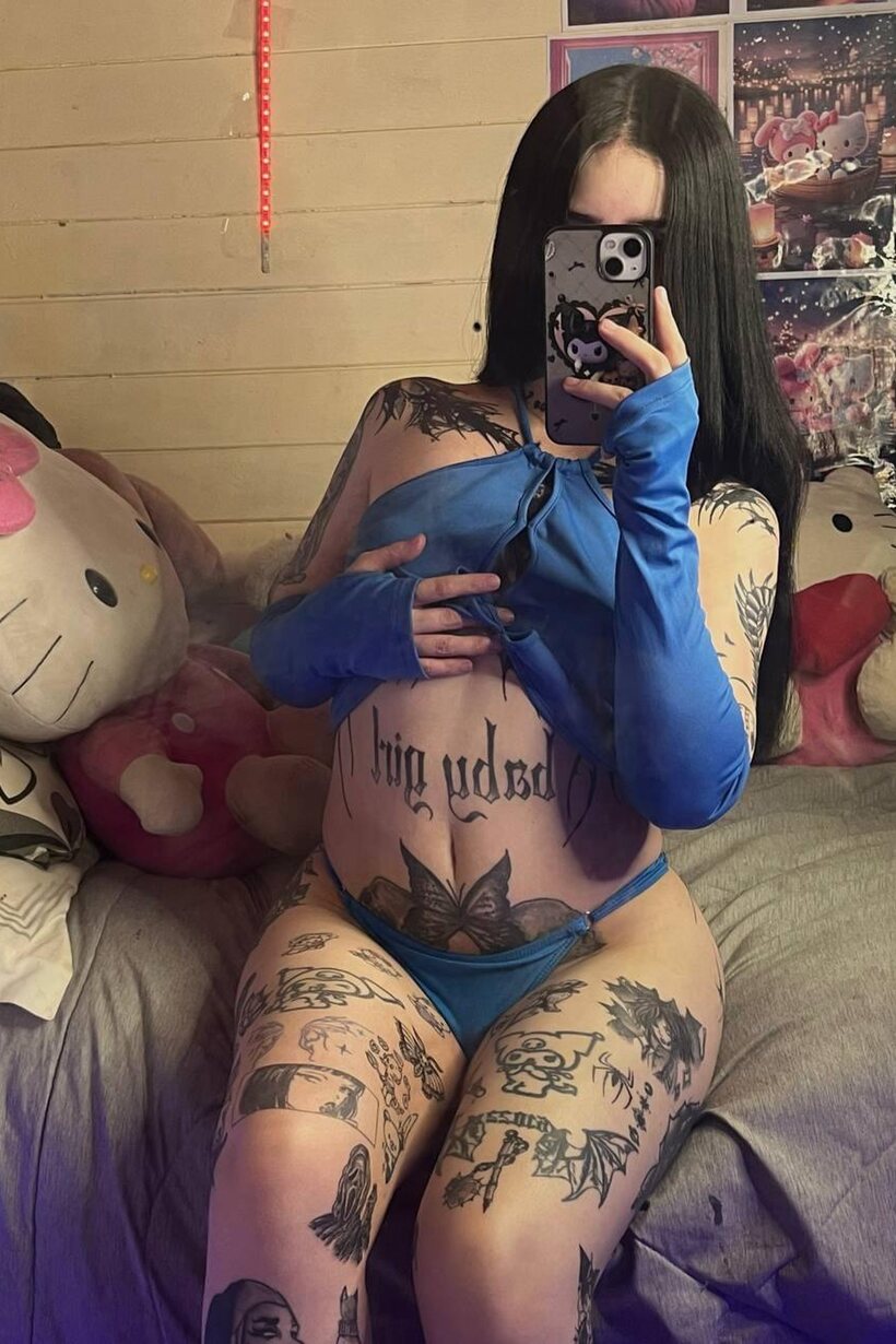 Photo 16 — Selfie shots from a dark-haired amateur in a sheer top and thong