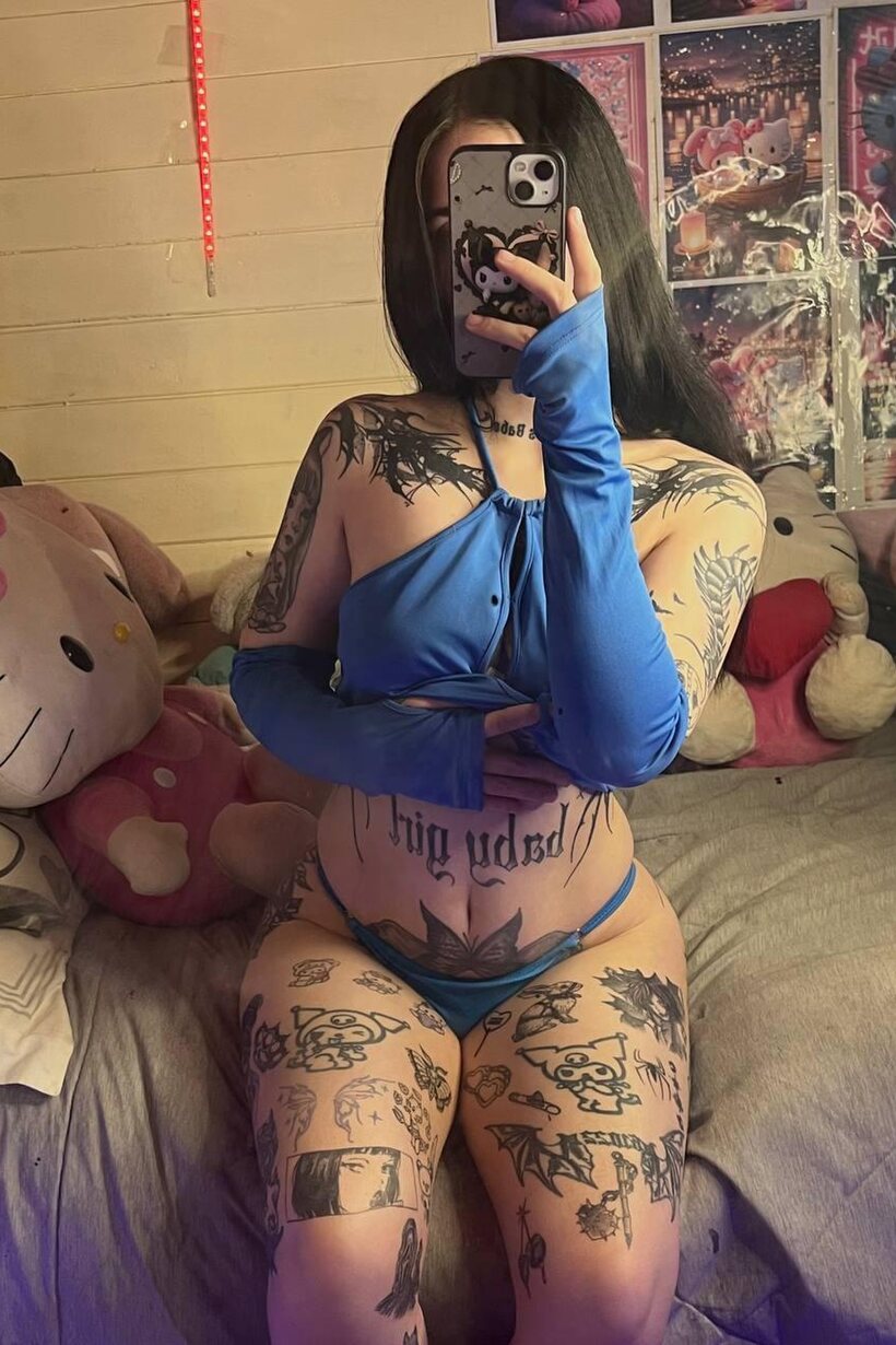 Selfie shots from a dark-haired amateur in a sheer top and thong (shot 17)