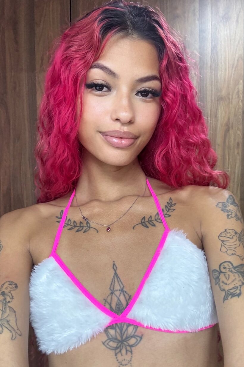 Photo 13 — Latina girl flaunts her natural tits
