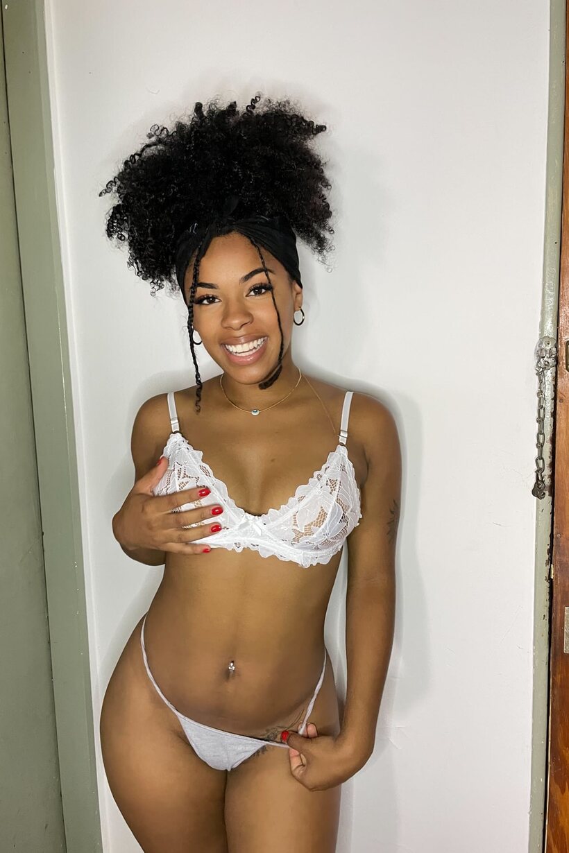 African nude photo 3 — Curvy ebony model poses in lingerie and a bikini, showing ass