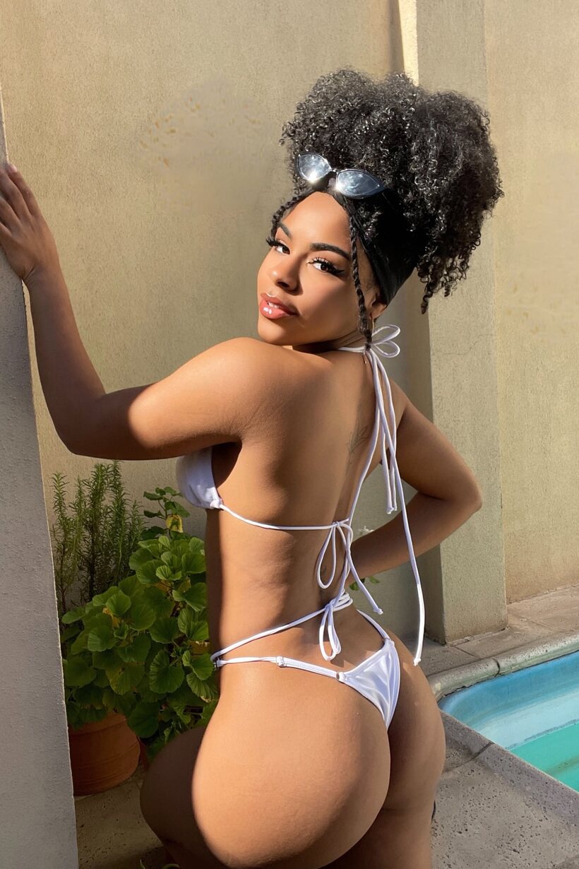Curvy ebony model poses in lingerie and a bikini, showing ass, photo 17 of 20