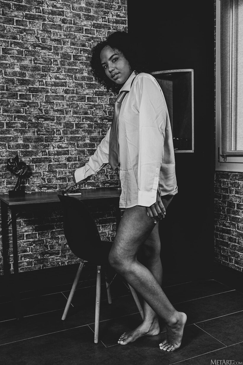 Romy Indy nude photo 19 — Romy Indy strips, revealing her shaved pussy in ebony style