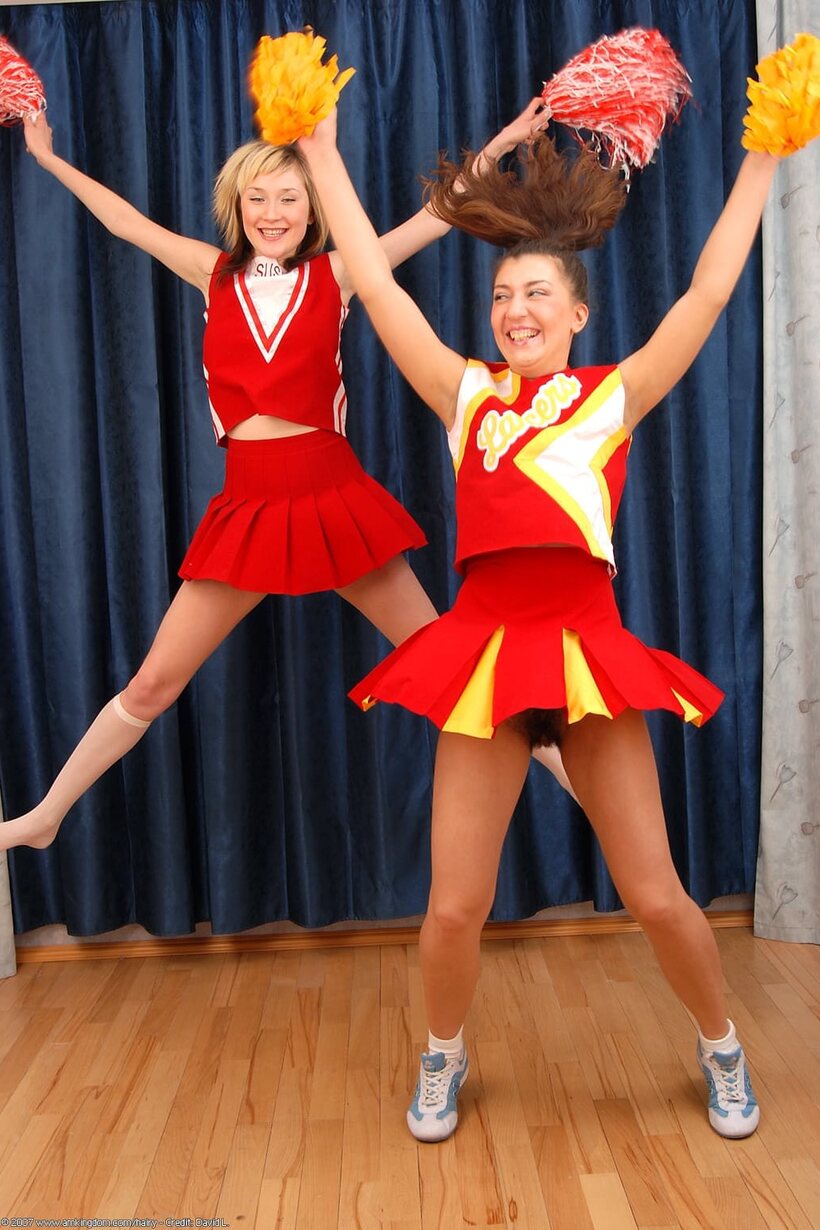 Amateur nude photo 8 — Cheerleaders flash their pussies before a lesbian licking session
