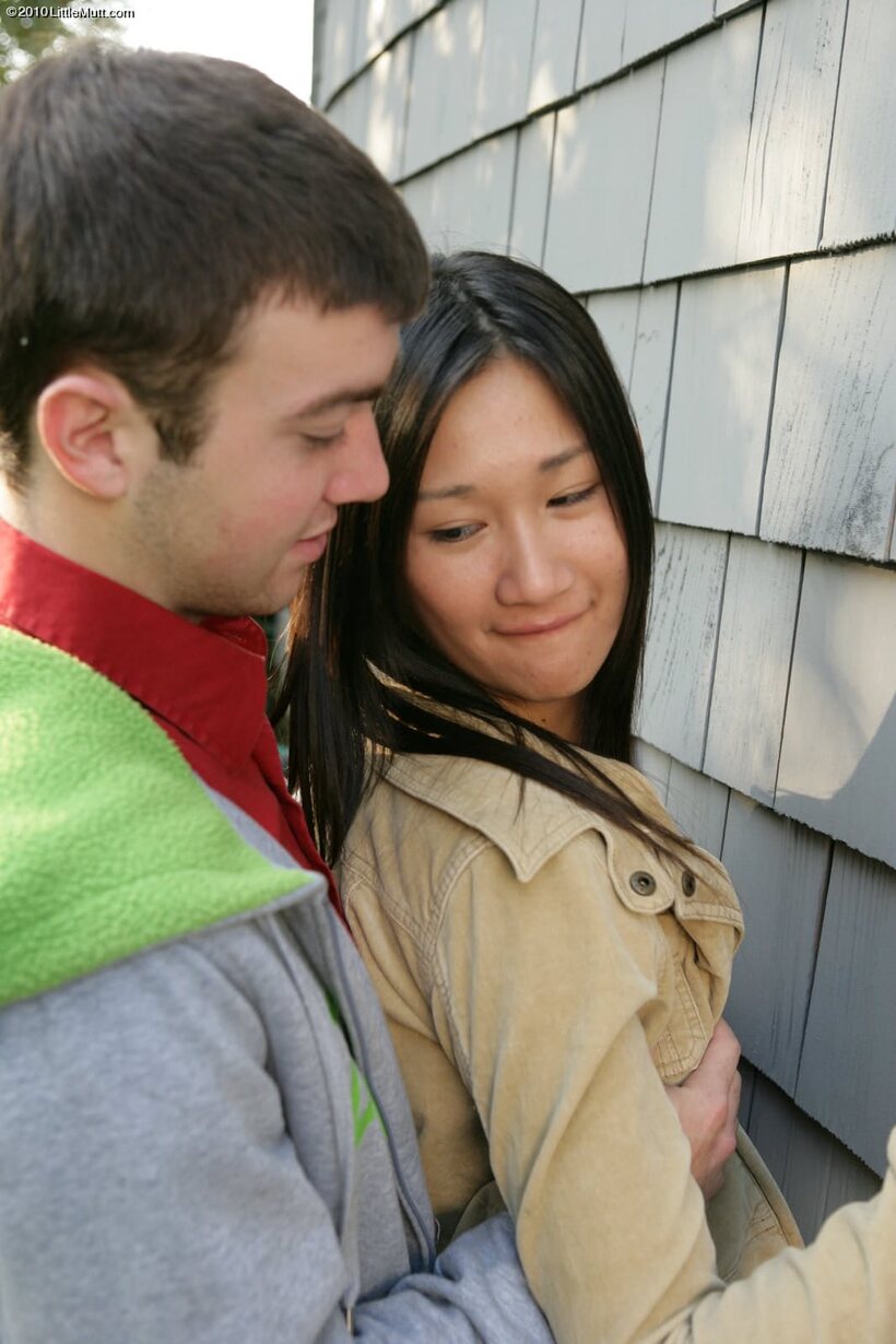 Tai Lee Liam and her boyfriend fuck against the siding (shot 1)