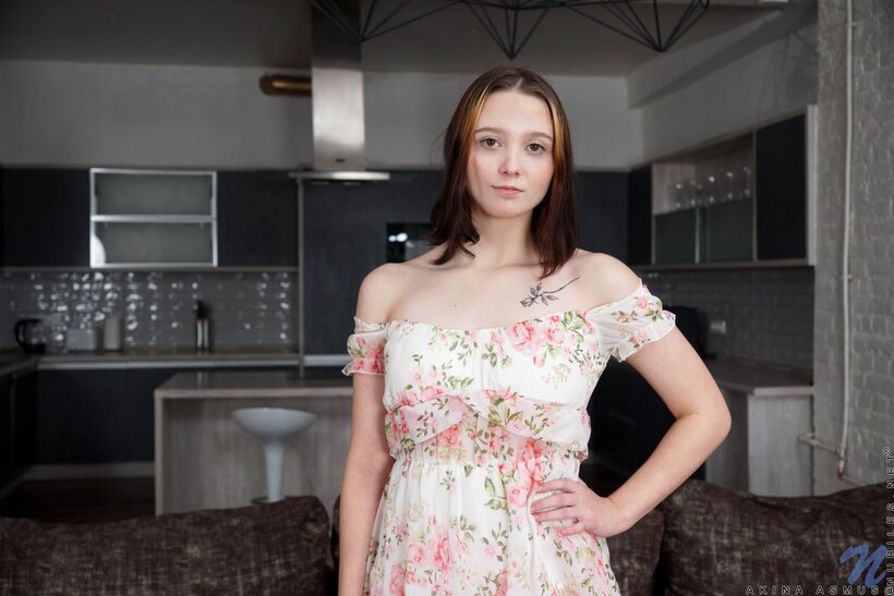 Amateur nude photo 3 — Akina Asmus lifts her skirt and spreads her shaved pussy in the kitchen