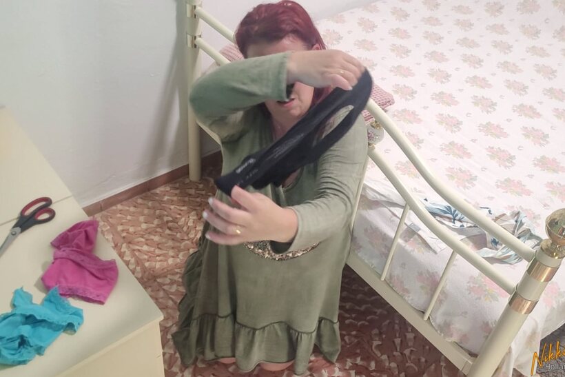 Nikki Holland blindfolds herself while toying with her panties in a dress, photo 8 of 15