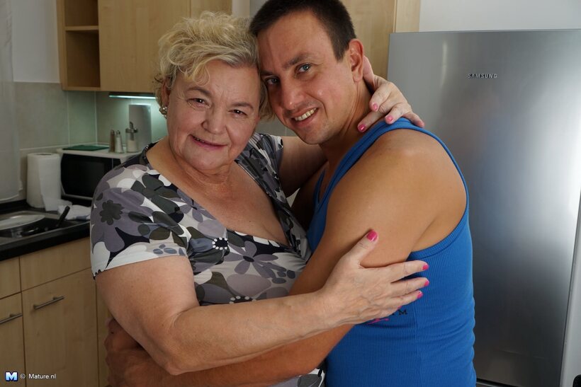 Sexy boy licks the old fatty’s saggy tits in the kitchen (shot 2)