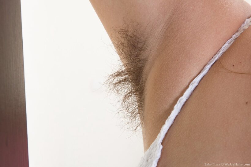 Cute Baby Lizza in stockings shows her hairy pussy and nipples, photo 2 of 16