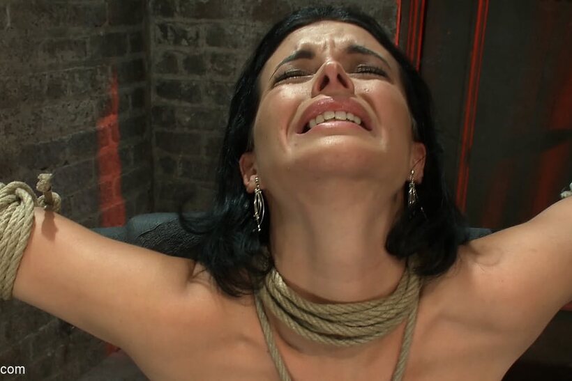 Photo 7 — Bailey Brooks hogtied gets her clit teased by her master