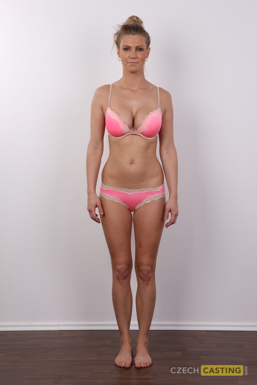 Image 5/20: Stripping off dress and panties, a blonde amateur poses naked alone