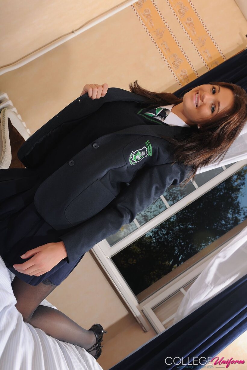 Image 5/21: Nickie Ann strips in the bedroom, showing off her small tits