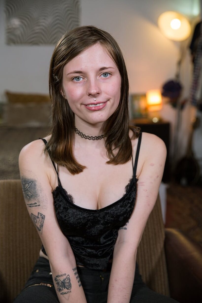 Sam undresses and poses nude in a kinky solo scene, photo 3 of 20