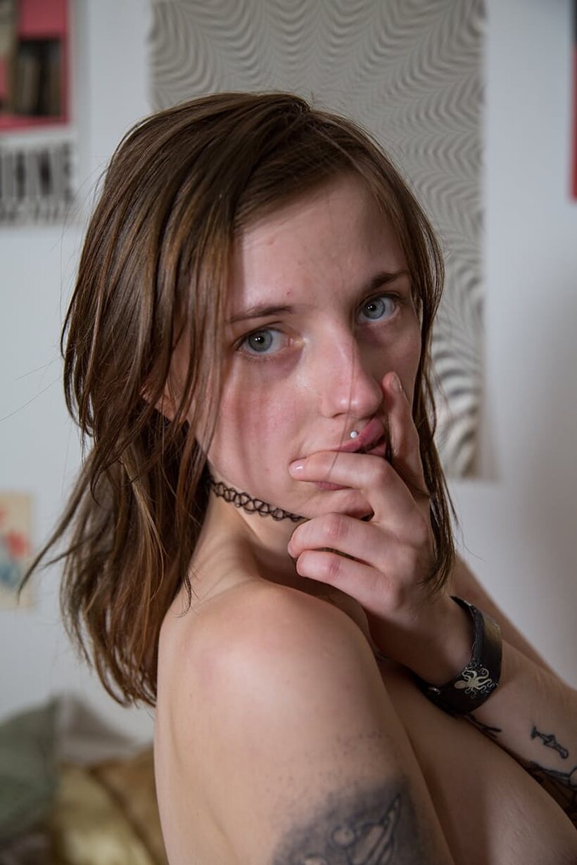 Sam undresses and poses nude in a kinky solo scene, photo 19 of 20